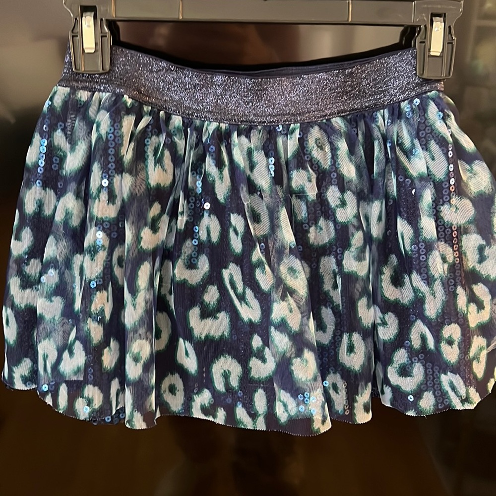 Justice blue leopard skirt, size 10.